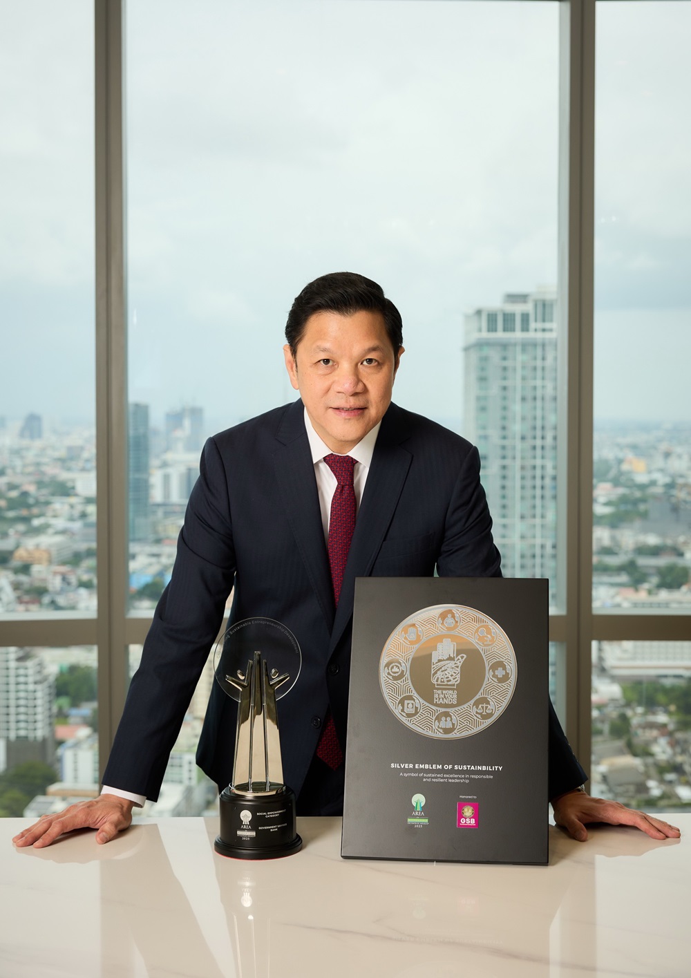 ออมสิน คว้า 2 รางวัลระดับเอเชีย AREA 2025“Silver Emblem of Sustainability”และ“Social Empowerment”ตอกย้ำบทบาท Social Bank ผ่านนวัตกรรมความปลอดภัย MyMo Secure Plus